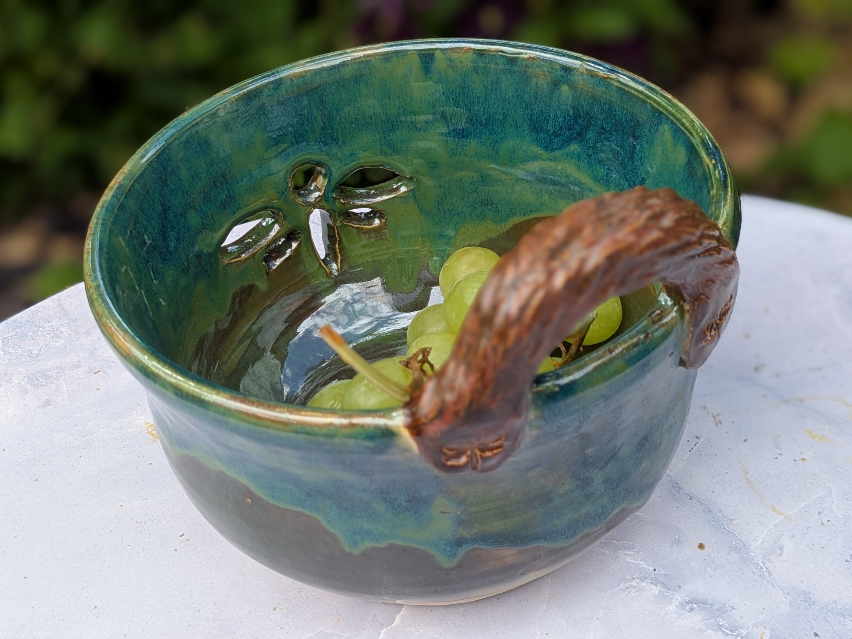  - Hand-thrown on the wheel, with handcarved openings. 