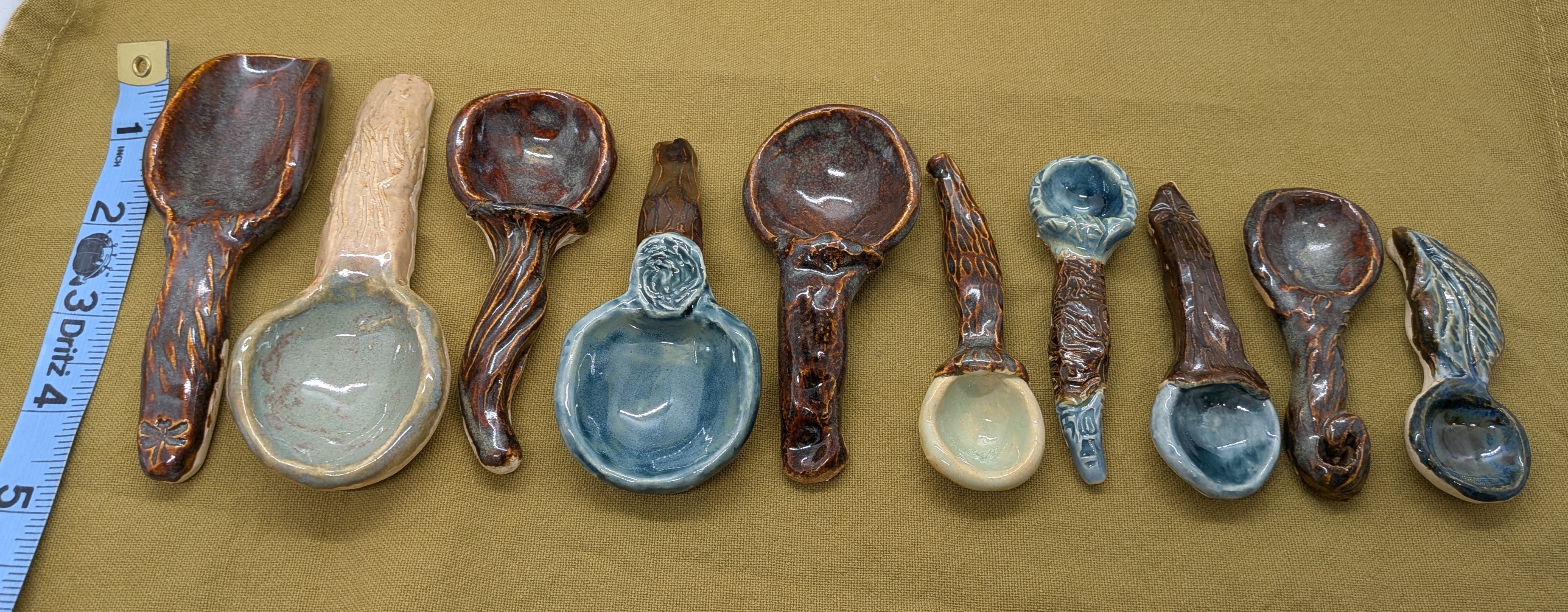 Sugar and Spice Scoops - I use these scoops for dry ingredients - sugar, spices, salt, etc. The ones at the larger end of the scale would be great for scooping coffee and loose-leaf tea, too! 

All are inspired by nature, in shades of earthy browns and greens, with textures that often resemble pebbles or tree bark. I love how they feel in my hands, and how they look on wooden tables, especially. 

These pair nicely with my salt cellars and spoon rests, too.

Price is per item. - 15