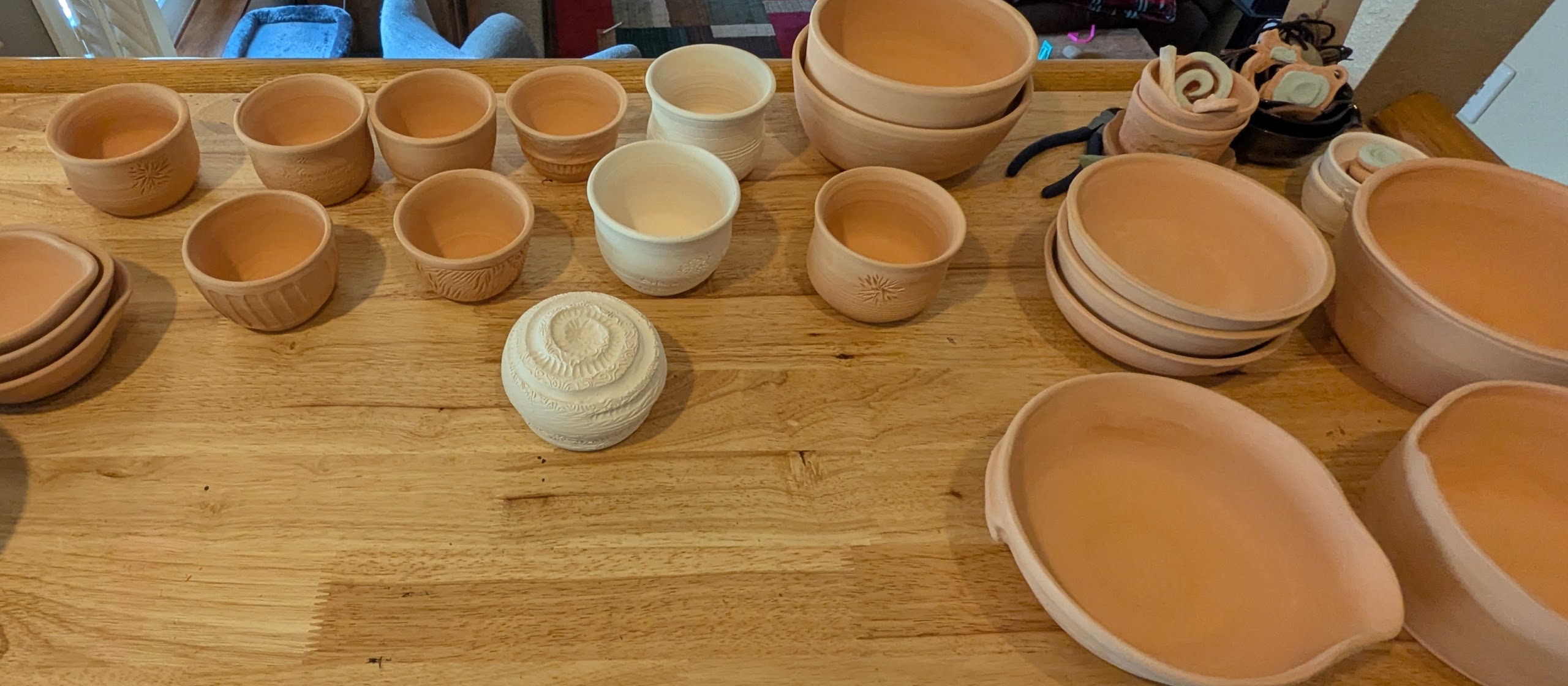 Stay Tuned! - Pottery is a lengthy process! Making, drying, handcarving/trimming, drying some more, firing, glazing, and re-firing can take anywhere from 3-6 weeks depending on scheduling and timing of all the steps. Even the weather can affect drying speed for the clay. 

It's my goal to re-stock and post new collections of items about every 2-3 months. So check back regularly and mark your calendar for my next drop! And remember - every item is entirely handmade. No molds, no duplicates. Every piece is truly unique in one way or another, even if coloring is the same.

So when you see something you love - or that you think a loved one will enjoy - go ahead and grab it when you can!

 - 